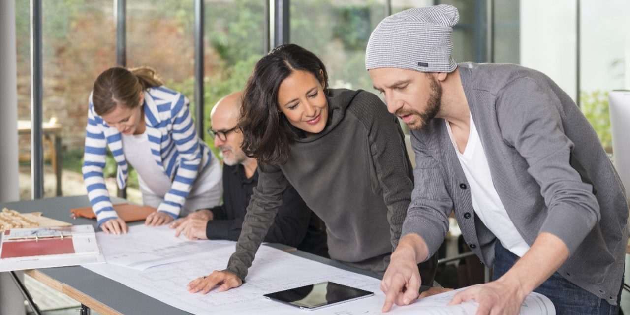 Architects collaborating at their office