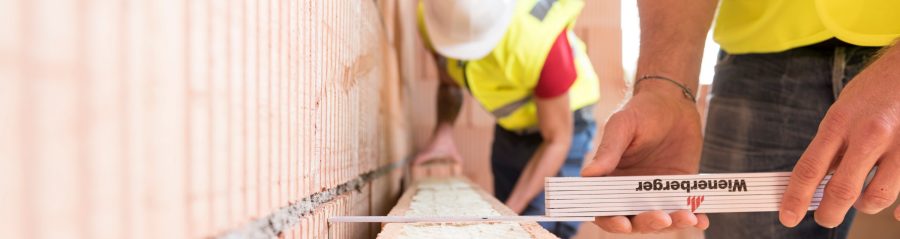 Measuring the distance of insulation filled clay blocks and existing wall