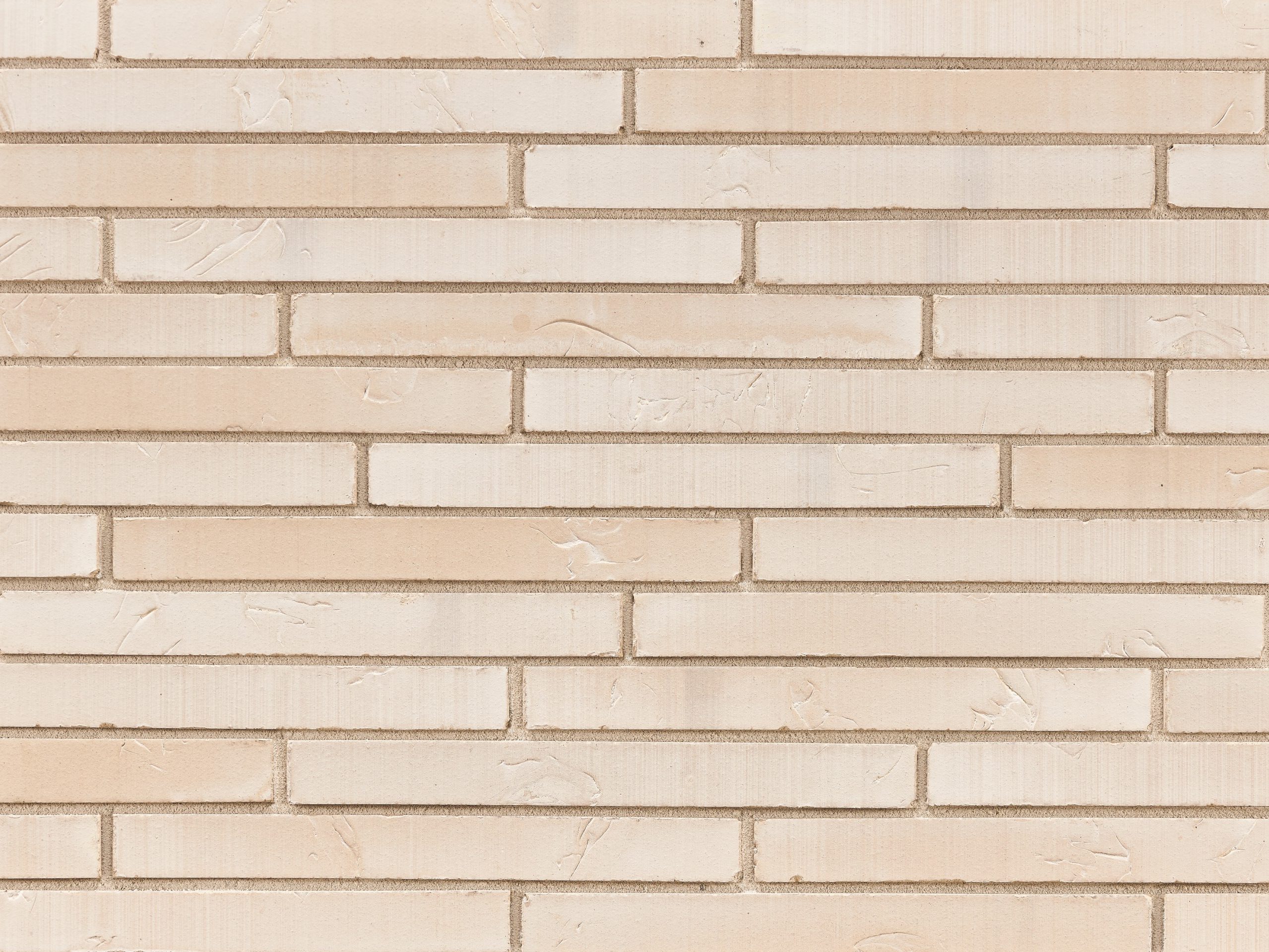 Zid od opeke premazan bijelom bojom