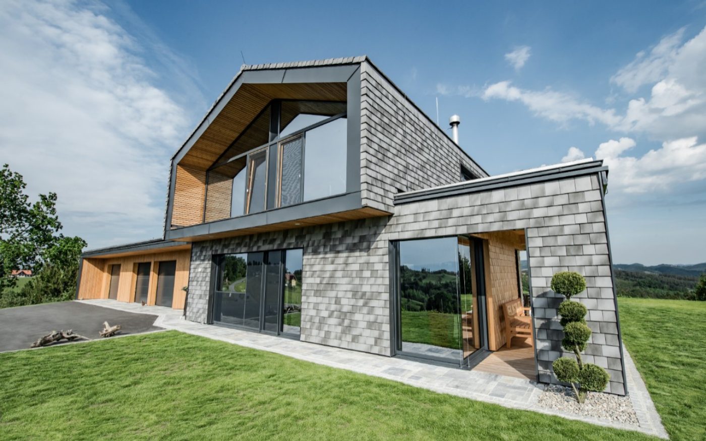 Designhaus u Štajerskoj s Tondach Tasche crijepom bijelo-sivo-antik - moderna obiteljska kuća