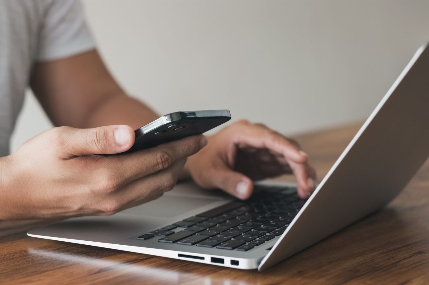 Work using mobile phone typing computer mobile chat laptop contact us at workplaces, planning ideas investors internet searching, ideas connecting people.