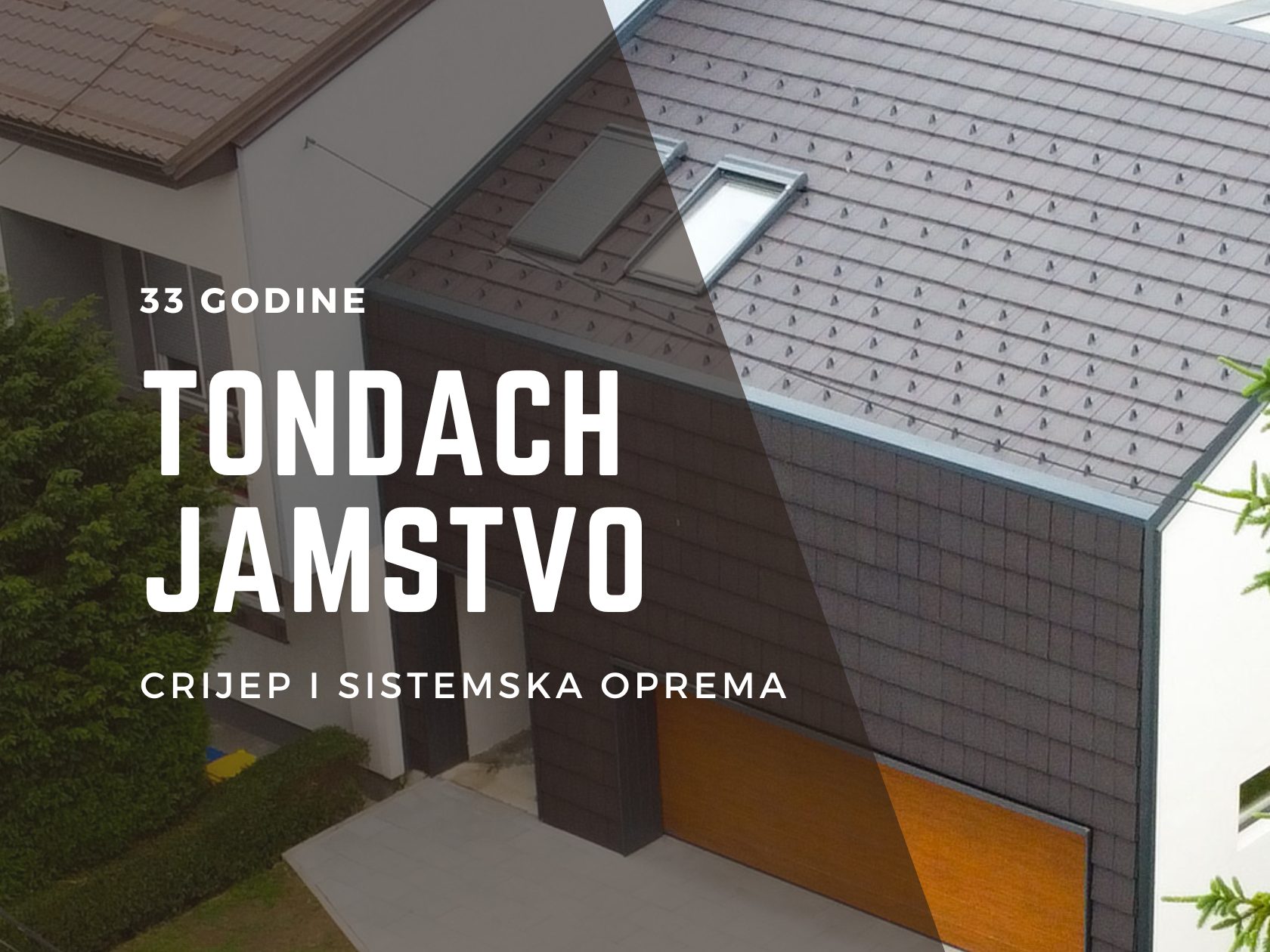 Tondach jamstvo 33 godine - moderna obiteljska kuća s tamnosivim Tondach crijepom i sistemskom opremom