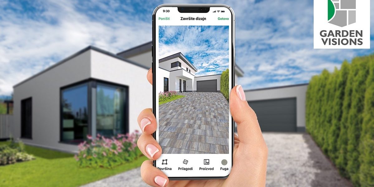 Ruka koja drži mobitel na kojem je prikazana Garden Vision aplikacija