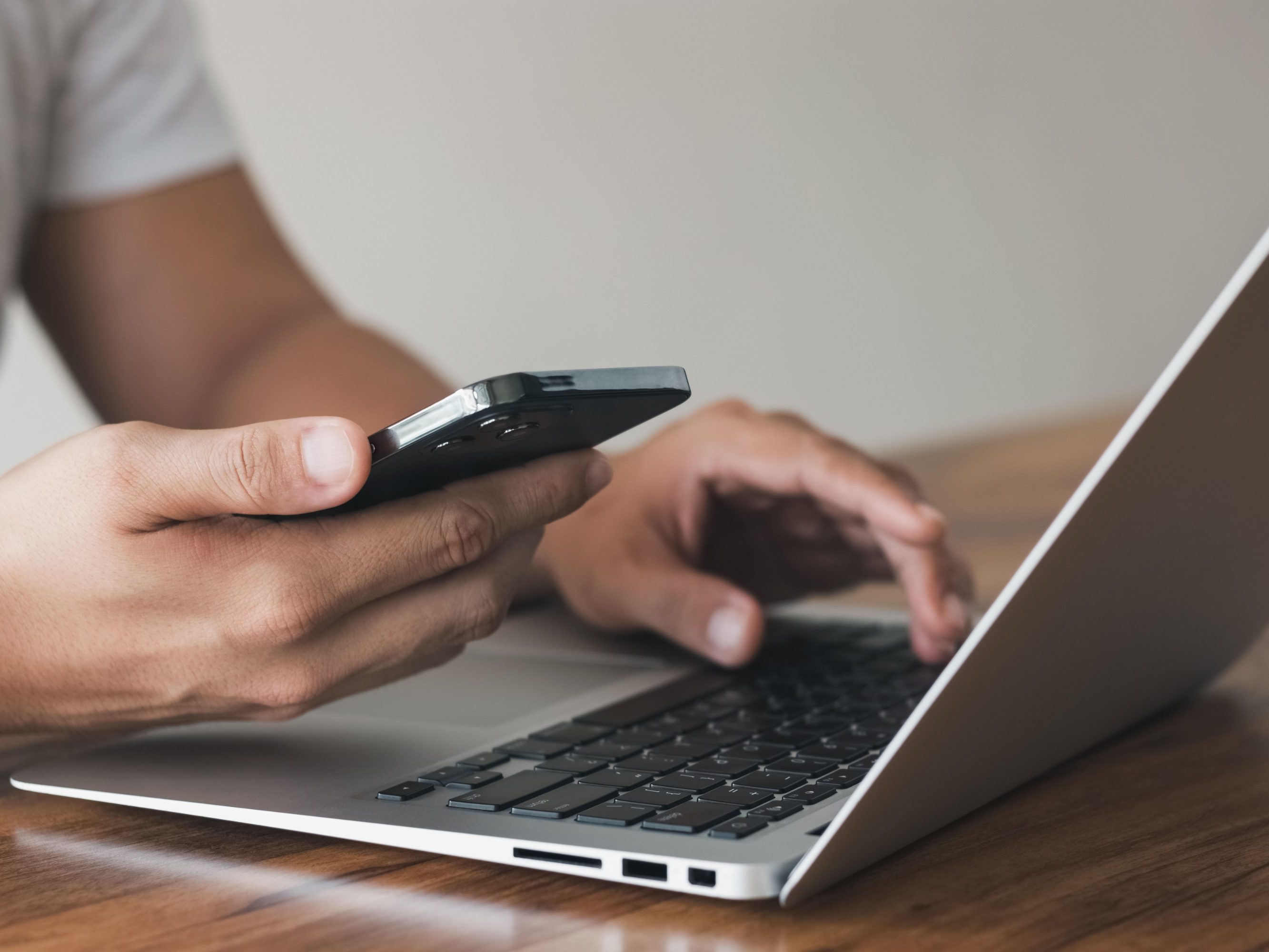 Work using mobile phone typing computer mobile chat laptop contact us at workplaces, planning ideas investors internet searching, ideas connecting people.