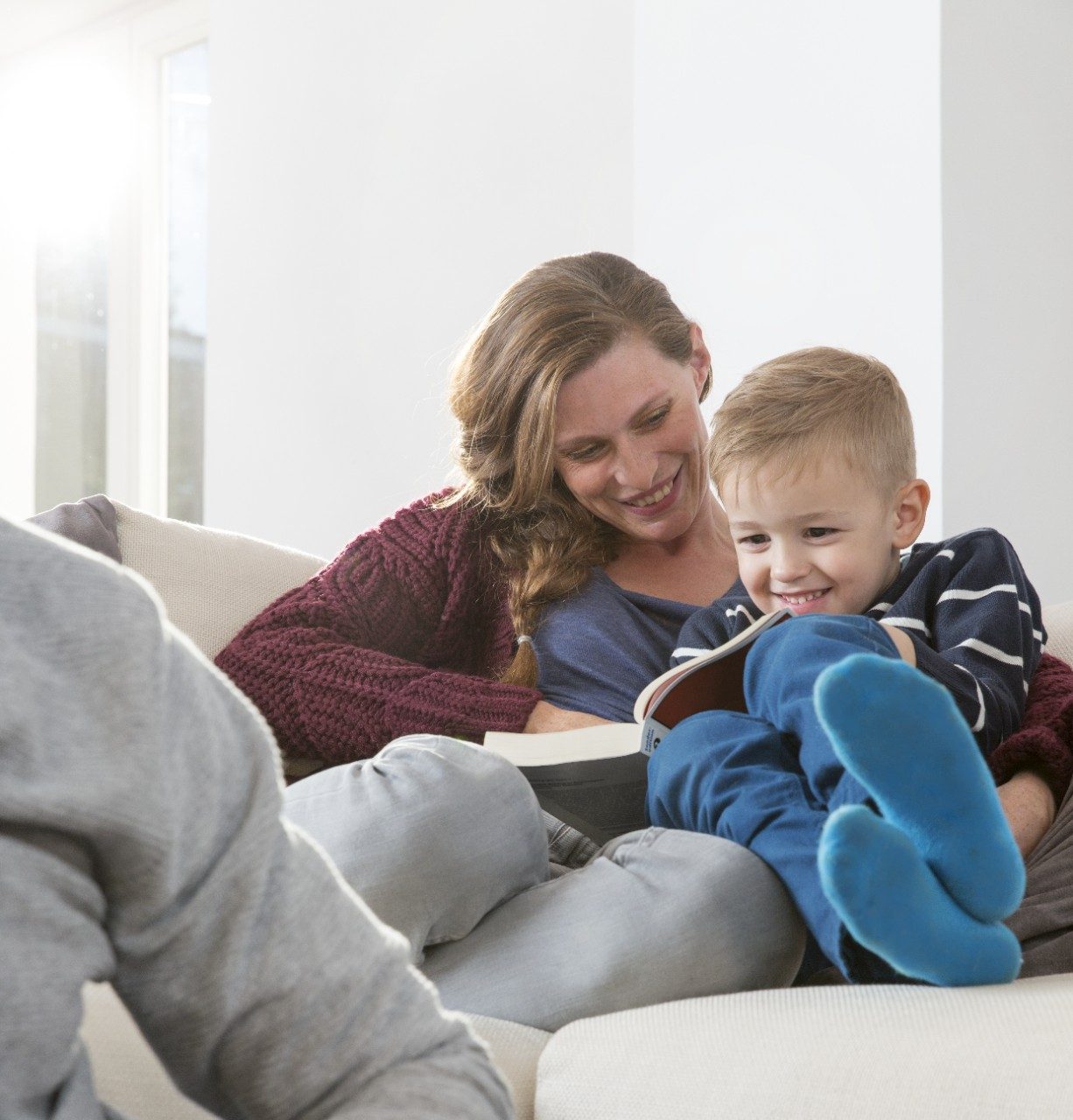 Mother and child reading a book